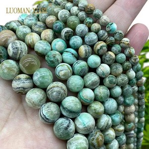 Мъниста от Phoenix stone - комбиниран естествен минерал 6/8 мм